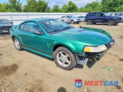 Czwarte zdjęcie samochodu z boku: 2000 FORD MUSTANG VIN:1FAFP4041YF247106 - miniatura