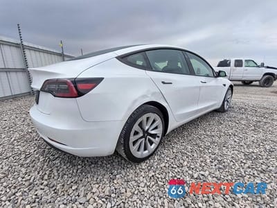 Trzecie zdjęcie samochodu z tyłu: 2023 TESLA MODEL 3 VIN:5YJ3E1EA9PF457777 - miniatura