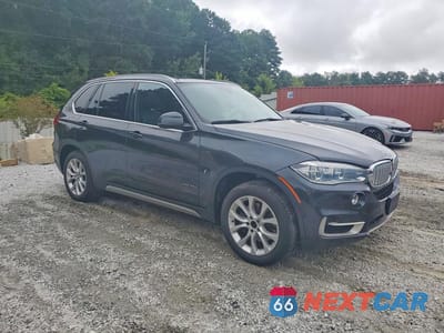 Czwarte zdjęcie samochodu z boku: 2018 BMW X5 XDR40E VIN:5UXKT0C5XJ0W00757 - miniatura