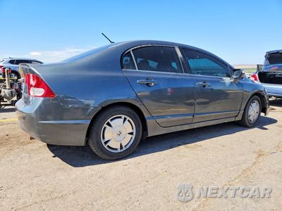 Trzecie zdjęcie samochodu z tyłu: 2010 HONDA CIVIC HYBRID VIN:JHMFA3F26AS006911 - miniatura