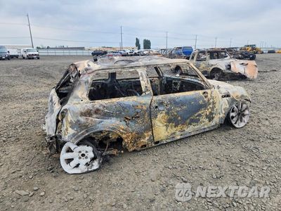Trzecie zdjęcie samochodu z tyłu: 2002 MINI COOPER S VIN:WMWRE33472TD53975 - miniatura