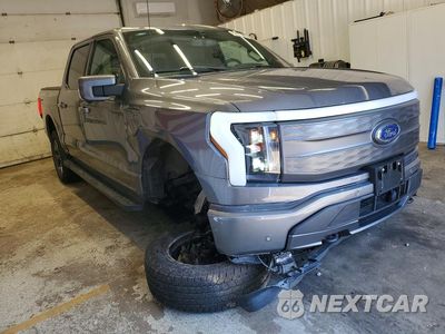 Czwarte zdjęcie samochodu z boku: 2023 FORD F150 LIGHTNING PRO VIN:1FT6W1EVXPWG21403 - miniatura