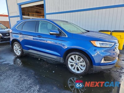 Czwarte zdjęcie samochodu z boku: 2022 FORD EDGE TITANIUM VIN:2FMPK4K95NBB04755 - miniatura