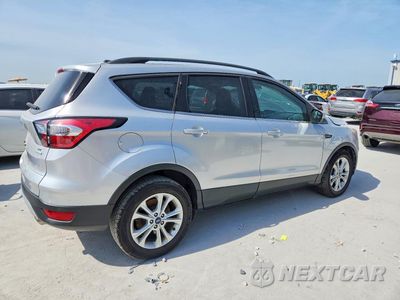Trzecie zdjęcie samochodu z tyłu: 2018 FORD ESCAPE SE VIN:1FMCU0G92JUB49733 - miniatura