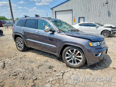 Czwarte zdjęcie samochodu z boku: 2017 JEEP GRAND CHEROKEE OVERLAND VIN:1C4RJFCG0HC942253 - miniatura