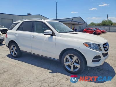 Czwarte zdjęcie samochodu z boku: 2017 MERCEDES-BENZ GLE 350 VIN:4JGDA5JB7HA971879 - miniatura