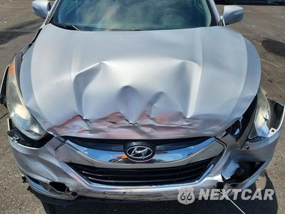 Zdjęcie 12 z 13 samochodu: 2012 HYUNDAI TUCSON LIMITED VIN:KM8JU3AC3CU523220 - miniatura