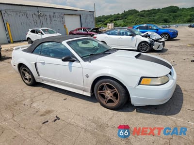 Czwarte zdjęcie samochodu z boku: 1999 FORD MUSTANG GT VIN:1FAFP45X7XF206013 - miniatura