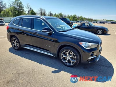 Czwarte zdjęcie samochodu z boku: 2018 BMW X1 XDRIVE28I VIN:WBXHT3C37J5F89916 - miniatura