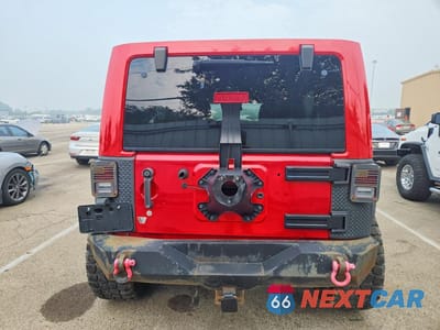 Zdjęcie 6 z 13 samochodu: 2014 JEEP WRANGLER UNLIMITED SAHARA VIN:1C4BJWEG0EL128355 - miniatura