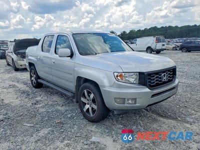 Czwarte zdjęcie samochodu z boku: 2014 HONDA RIDGELINE RTL-S VIN:5FPYK1F61EB007179 - miniatura