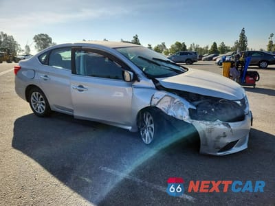 Czwarte zdjęcie samochodu z boku: 2019 NISSAN SENTRA SV VIN:3N1AB7AP1KL618858 - miniatura