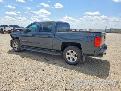 Drugie zdjęcie samochodu z przodu: 2018 CHEVROLET SILVERADO K1500 LT VIN:3GCUKREC1JG299143 - miniatura
