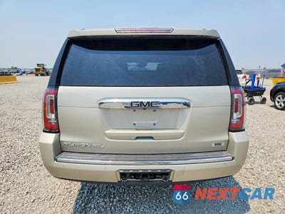 Zdjęcie 6 z 13 samochodu: 2017 GMC YUKON XL DENALI VIN:1GKS2HKJ0HR147583 - miniatura