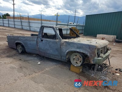 Czwarte zdjęcie samochodu z boku: 1988 DODGE DAKOTA VIN:1B7GN14X7JS692664 - miniatura