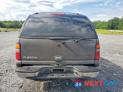 Zdjęcie 6 z 12 samochodu: 2002 GMC YUKON VIN:1GKEC13Z12J282485 - miniatura