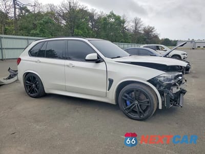 Czwarte zdjęcie samochodu z boku: 2017 BMW X5 M VIN:5YMKT6C3XH0U39153 - miniatura