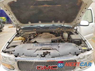 Zdjęcie 12 z 13 samochodu: 2005 GMC YUKON XL DENALI VIN:1GKFK66U45J190117 - miniatura