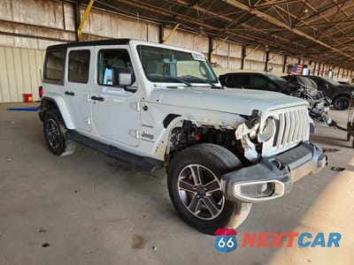 Czwarte zdjęcie samochodu z boku: 2023 JEEP WRANGLER SAHARA VIN:1C4HJXEN2PW693027 - miniatura
