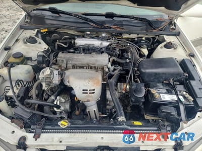 Zdjęcie 11 z 12 samochodu: 1999 TOYOTA CAMRY LE VIN:JT2BG28K0X0340421 - miniatura
