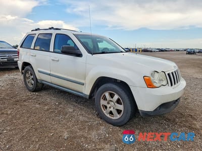 Czwarte zdjęcie samochodu z boku: 2009 JEEP GRAND CHEROKEE LAREDO VIN:1J8GS48KX9C512634 - miniatura