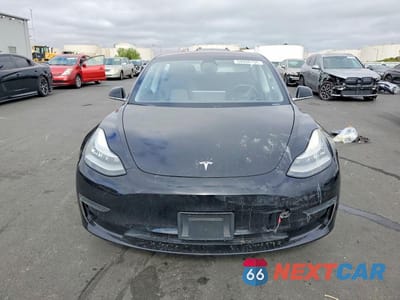 Piąte zdjęcie samochodu w środku: 2018 TESLA MODEL 3 VIN:5YJ3E1EA8JF044109 - miniatura