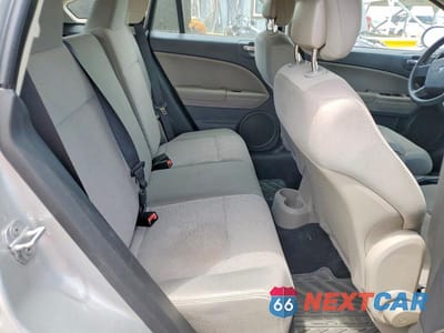 Zdjęcie 10 z 12 samochodu: 2011 DODGE CALIBER MAINSTREET VIN:1B3CB3HA3BD221014 - miniatura