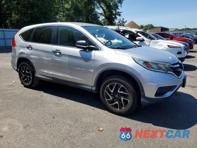 Czwarte zdjęcie samochodu z boku: 2016 HONDA CR-V SE VIN:2HKRM4H45GH714181 - miniatura