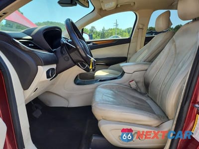 Zdjęcie 7 z 13 samochodu: 2015 LINCOLN MKC VIN:5LMCJ2A91FUJ47473 - miniatura