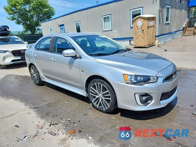 Czwarte zdjęcie samochodu z boku: 2017 MITSUBISHI LANCER ES VIN:JA32V2FW9HU001958 - miniatura
