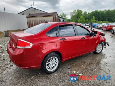 Trzecie zdjęcie samochodu z tyłu: 2010 FORD FOCUS SE VIN:1FAHP3FN8AW111855 - miniatura