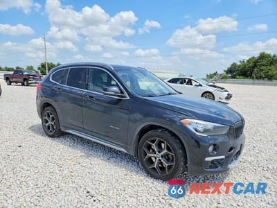 Czwarte zdjęcie samochodu z boku: 2018 BMW X1 SDRIVE28I VIN:WBXHU7C32J5H40164 - miniatura