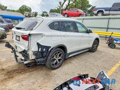 Trzecie zdjęcie samochodu z tyłu: 2018 BMW X1 XDRIVE28I VIN:WBXHT3C32J5K31037 - miniatura