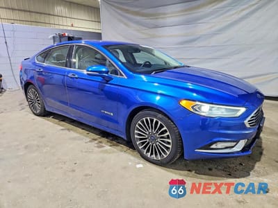 Czwarte zdjęcie samochodu z boku: 2017 FORD FUSION TITANIUM HEV VIN:3FA6P0RU9HR375477 - miniatura
