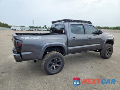 Trzecie zdjęcie samochodu z tyłu: 2017 TOYOTA TACOMA TRD SPORT VIN:3TMCZ5AN5HM079863 - miniatura