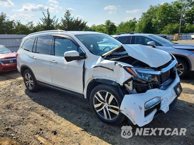 Czwarte zdjęcie samochodu z boku: 2018 HONDA PILOT TOURING VIN:5FNYF6H93JB065628 - miniatura