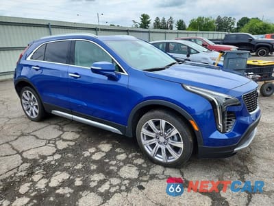 Czwarte zdjęcie samochodu z boku: 2021 CADILLAC XT4 PREMIUM LUXURY VIN:1GYFZDR46MF000028 - miniatura
