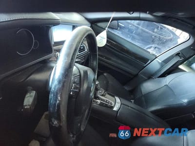 Zdjęcie 9 z 12 samochodu: 2015 BMW 740 LI VIN:WBAYE4C58FD139004 - miniatura