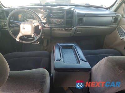 Zdjęcie 8 z 14 samochodu: 2002 CHEVROLET TAHOE C1500 VIN:1GNEC13V82R221894 - miniatura