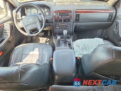 Zdjęcie 8 z 13 samochodu: 2002 JEEP GRAND CHEROKEE LIMITED VIN:1J8GW58NX2C225336 - miniatura