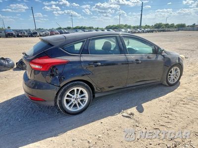 Trzecie zdjęcie samochodu z tyłu: 2017 FORD FOCUS SE VIN:1FADP3K28HL232424 - miniatura