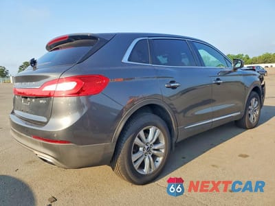 Trzecie zdjęcie samochodu z tyłu: 2018 LINCOLN MKX PREMIERE VIN:2LMPJ8JR5JBL13116 - miniatura