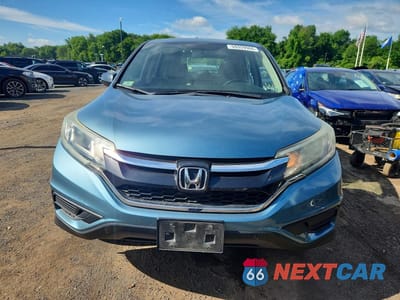 Piąte zdjęcie samochodu w środku: 2015 HONDA CR-V LX VIN:5J6RM4H37FL103600 - miniatura