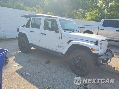 Czwarte zdjęcie samochodu z boku: 2021 JEEP WRANGLER UNLIMITED SAHARA 4XE VIN:1C4JJXP69MW784203 - miniatura