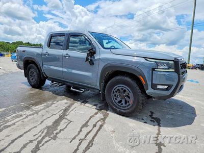 Czwarte zdjęcie samochodu z boku: 2026 NISSAN FRONTIER PRO-4X VIN:1N6ED1EK8TN605995 - miniatura