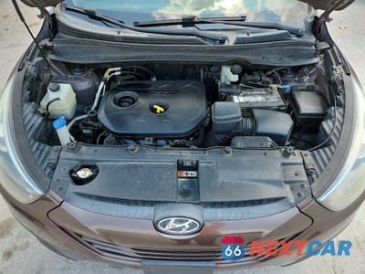 Zdjęcie 12 z 13 samochodu: 2014 HYUNDAI TUCSON GLS VIN:KM8JT3AFXEU850357 - miniatura