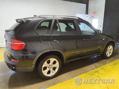 Trzecie zdjęcie samochodu z tyłu: 2012 BMW X5 XDRIVE50I VIN:5UXZV8C59CL425037 - miniatura