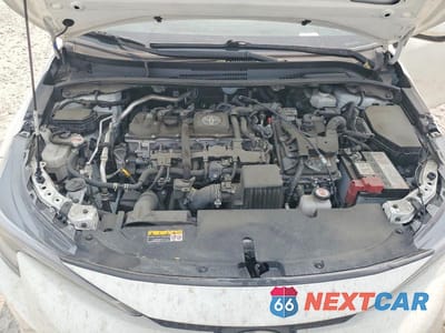 Zdjęcie 11 z 12 samochodu: 2023 TOYOTA COROLLA HYBRID LE VIN:JTDBCMFEXP3015835 - miniatura