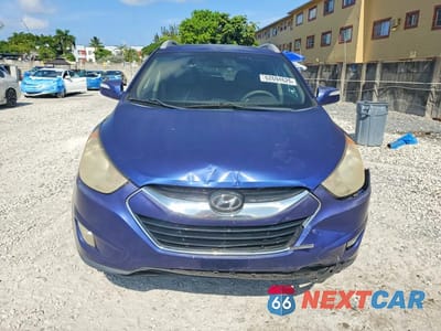 Piąte zdjęcie samochodu w środku: 2013 HYUNDAI TUCSON LIMITED VIN:KM8JU3AC1DU548991 - miniatura