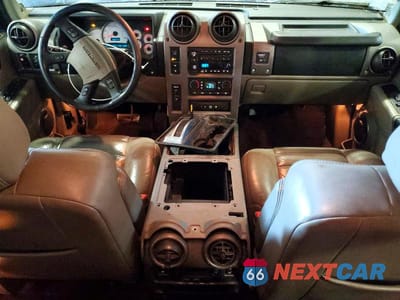 Zdjęcie 8 z 13 samochodu: 2003 HUMMER H2 VIN:5GRGN23U83H113399 - miniatura